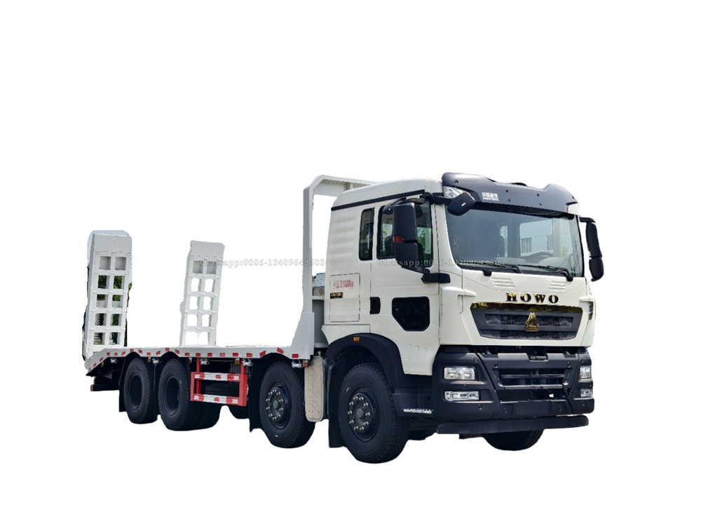 HOWO flatbed truck carring 20tons equipment